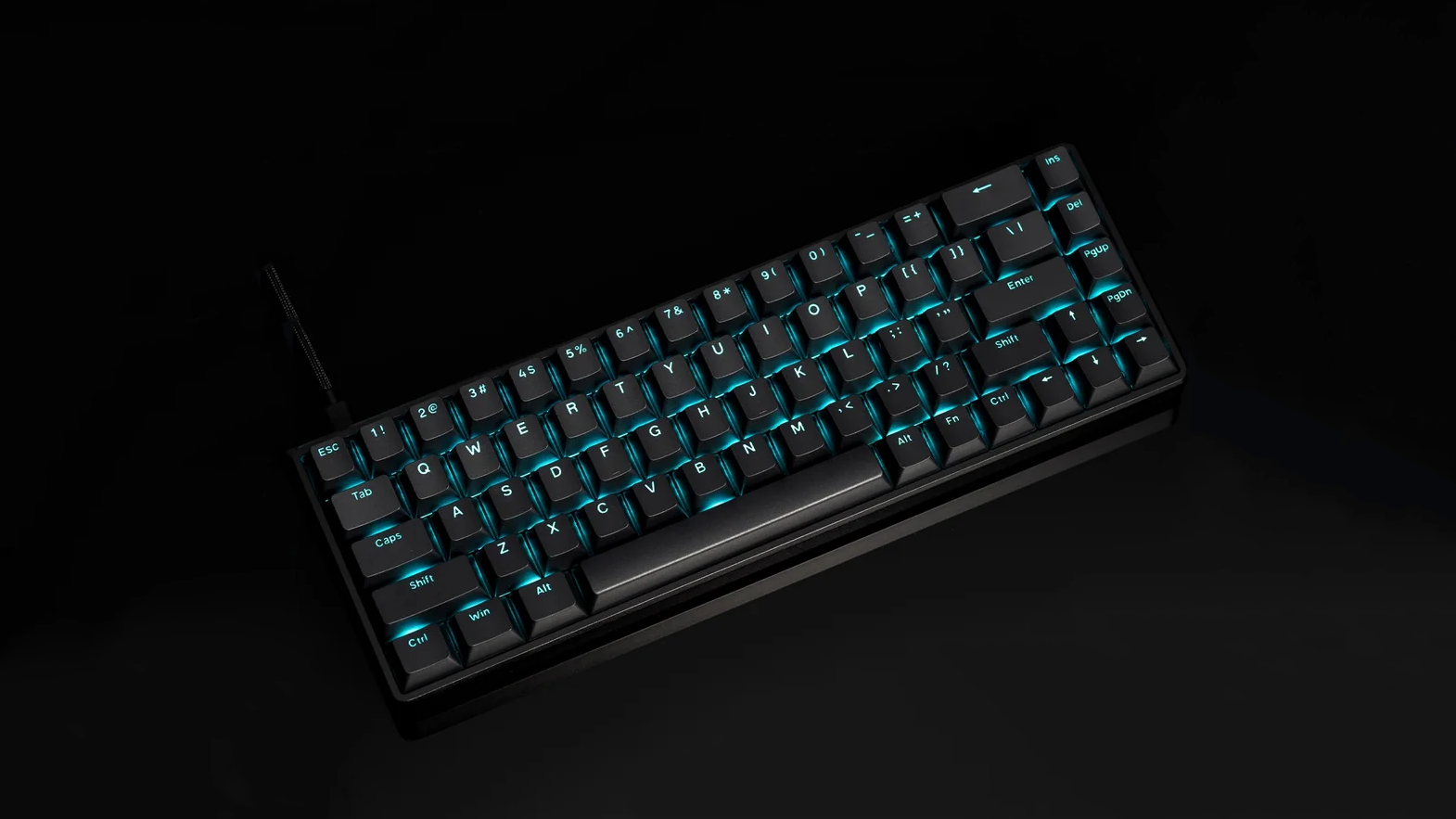 ATK68 mechanical gaming keyboard with cyan RGB backlighting on black keycaps