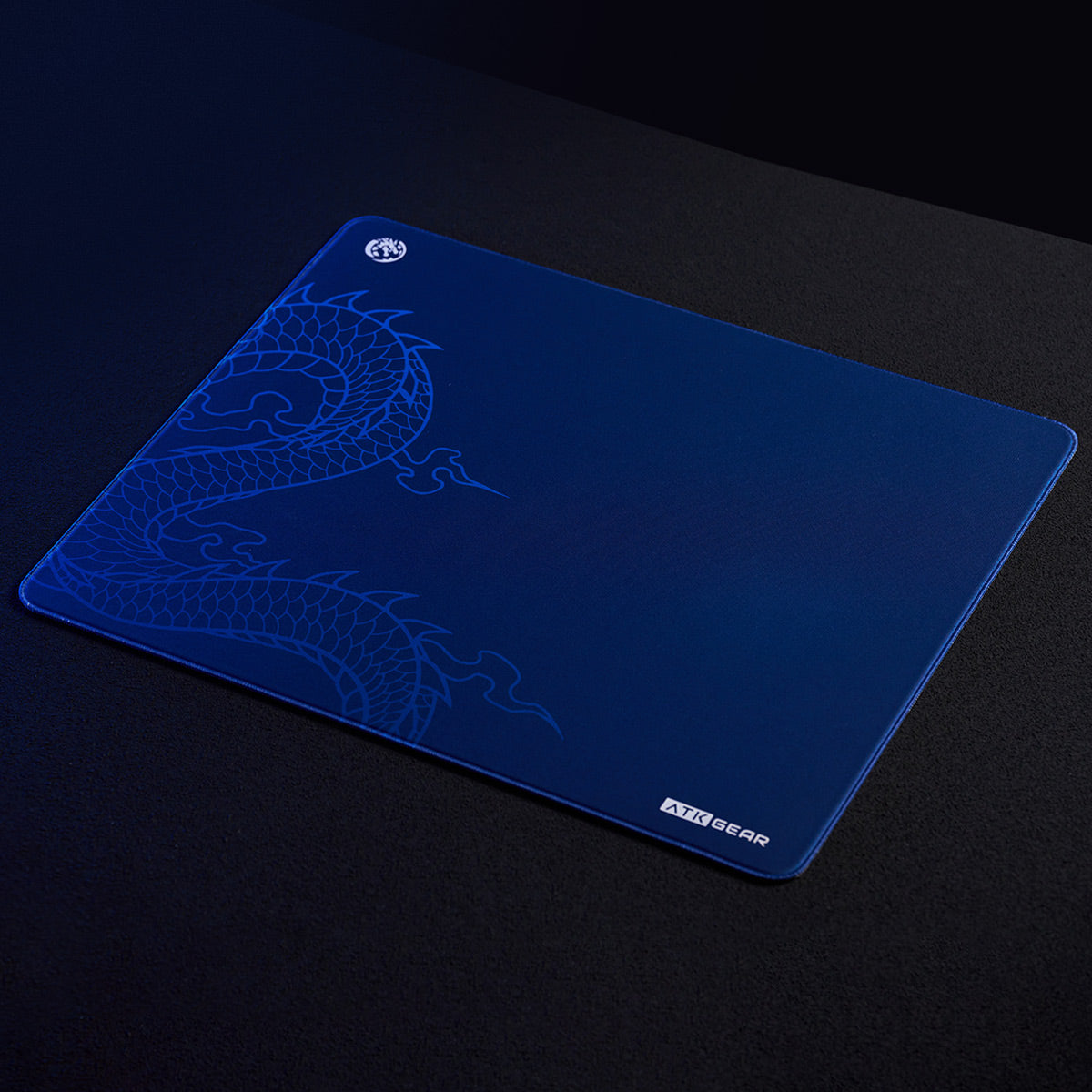 Blue ATK x LEVIATAN Esports gaming mouse pad with dragon design and ATK GEAR logo.
