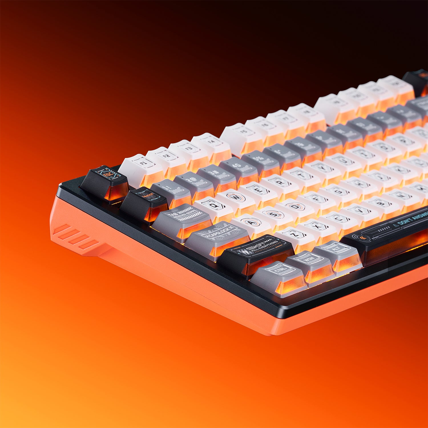 ATK RS7 Turbo esports keyboard with orange aluminum case and backlit keys