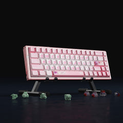 Pink ATK RS6 65% aluminum keyboard with floral graphics on white PBT keycaps.