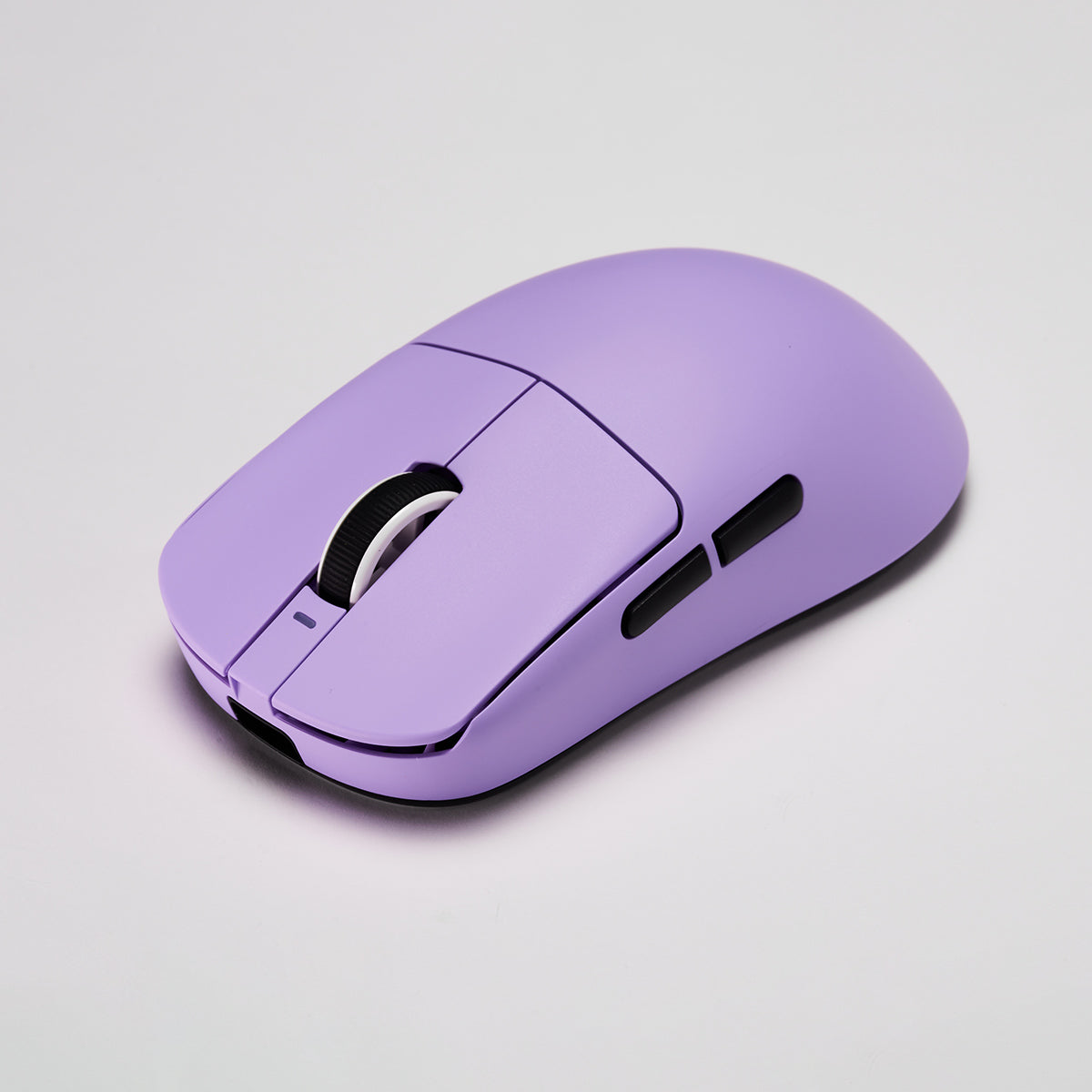 VXE Dragonfly R1 Series wireless gaming mouse in lavender with a textured scroll wheel and side buttons.