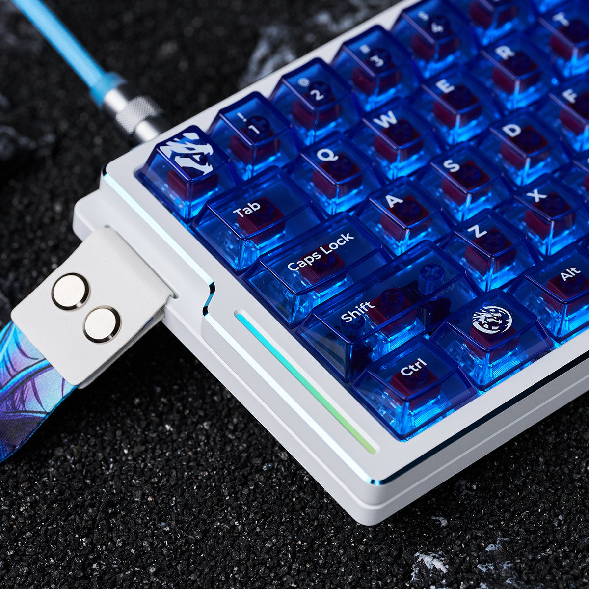 ATK EDGE 60HE LEVIATAN keyboard, white aluminum case, translucent blue PBT keycaps with dragon motif.