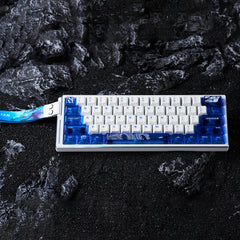 ATK EDGE 60HE Ultimate Esports keyboard, white with blue PBT keycaps, Leviathan dragon motif, 60% layout, aluminum case.