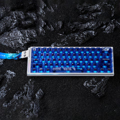 ATK EDGE 60HE LEVIATAN keyboard, white aluminum, blue PBT keycaps, dragon motif, 60% layout, blue LEDs.