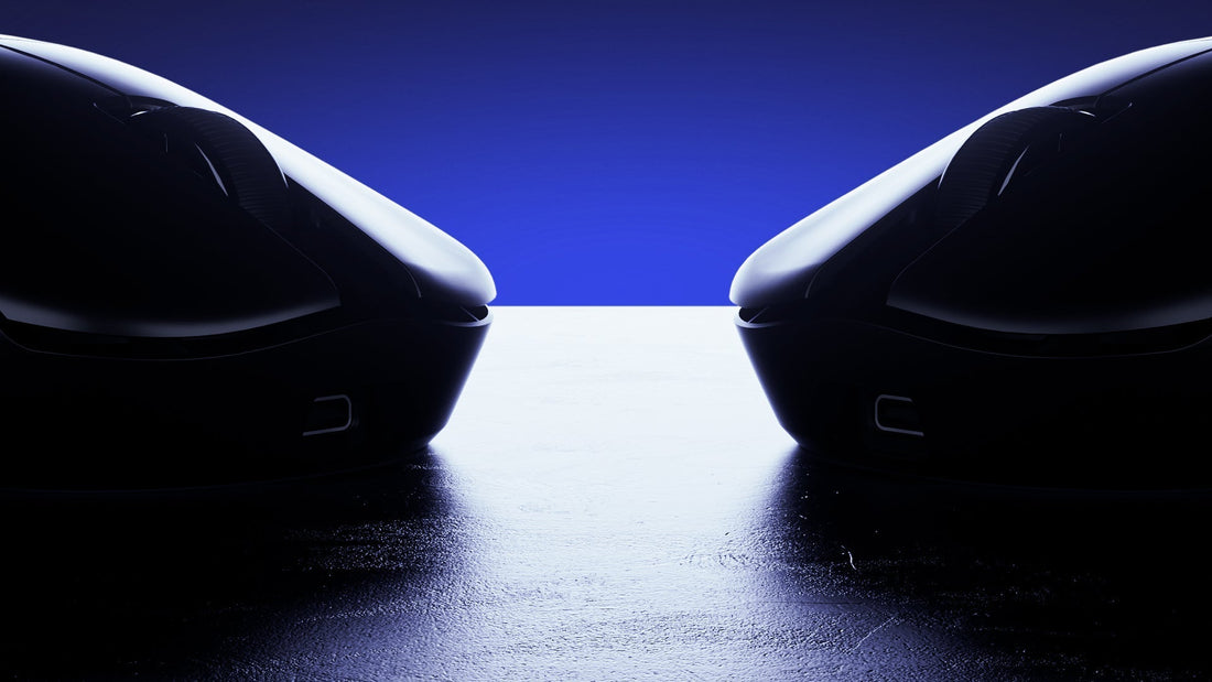 Silhouettes of two sleek gaming mice facing each other on a reflective surface with blue backlight.