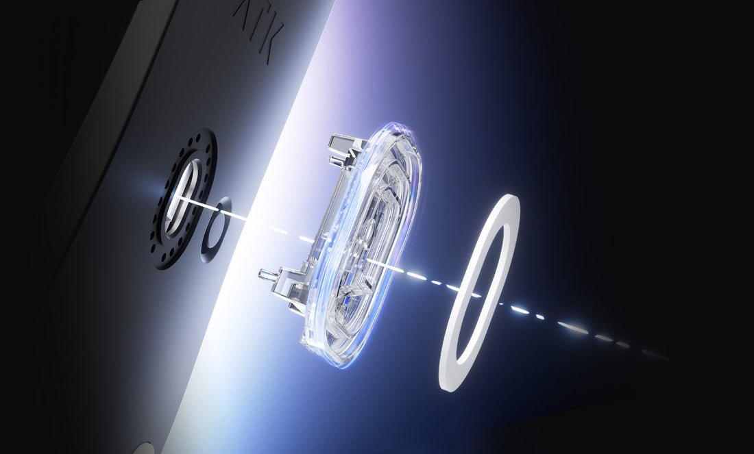 An exploded view of the optical sensor and lens inside a computer mouse.
