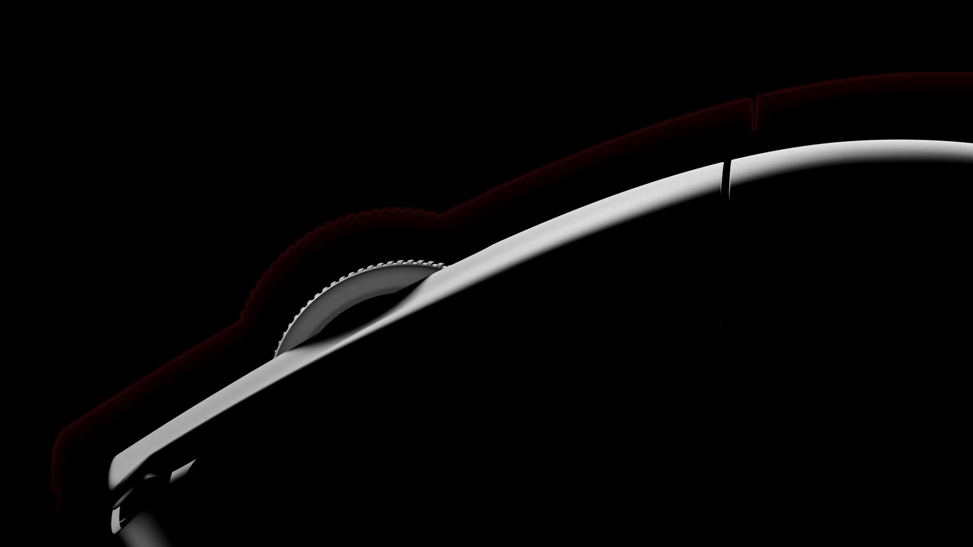 Close-up side view of a black gaming mouse with illuminated scroll wheel against a dark background.