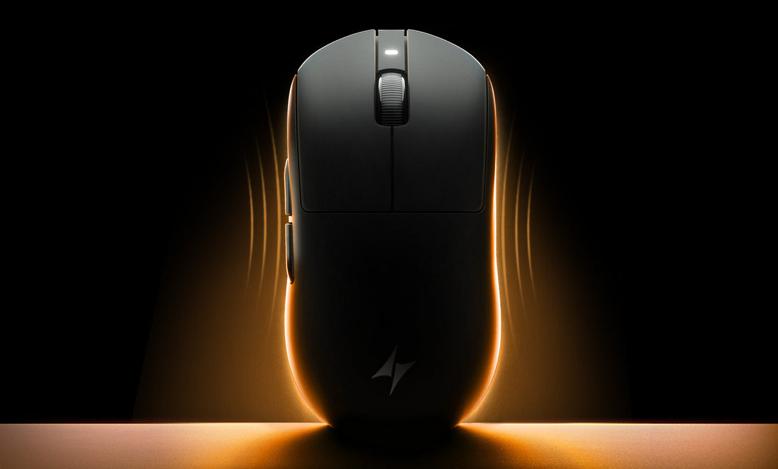 Black gaming mouse with orange glow.