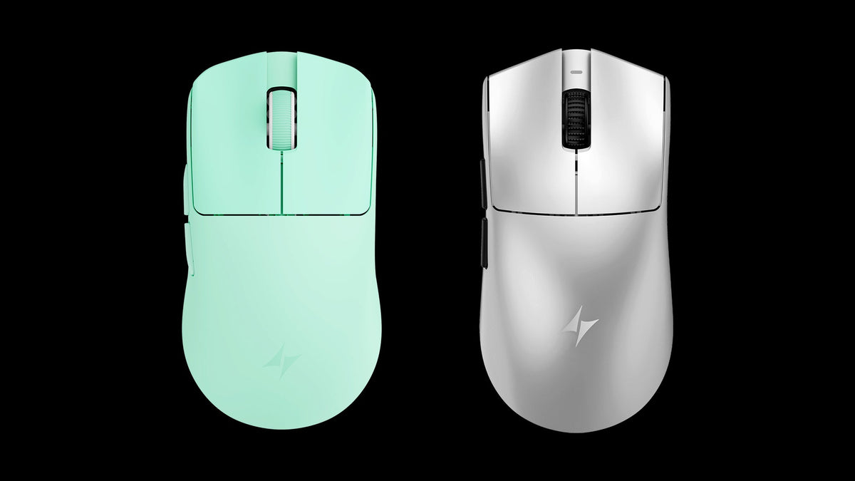 Top view of two ATK gaming mice in mint green and silver, highlighting their symmetrical shapes and scroll wheel designs.