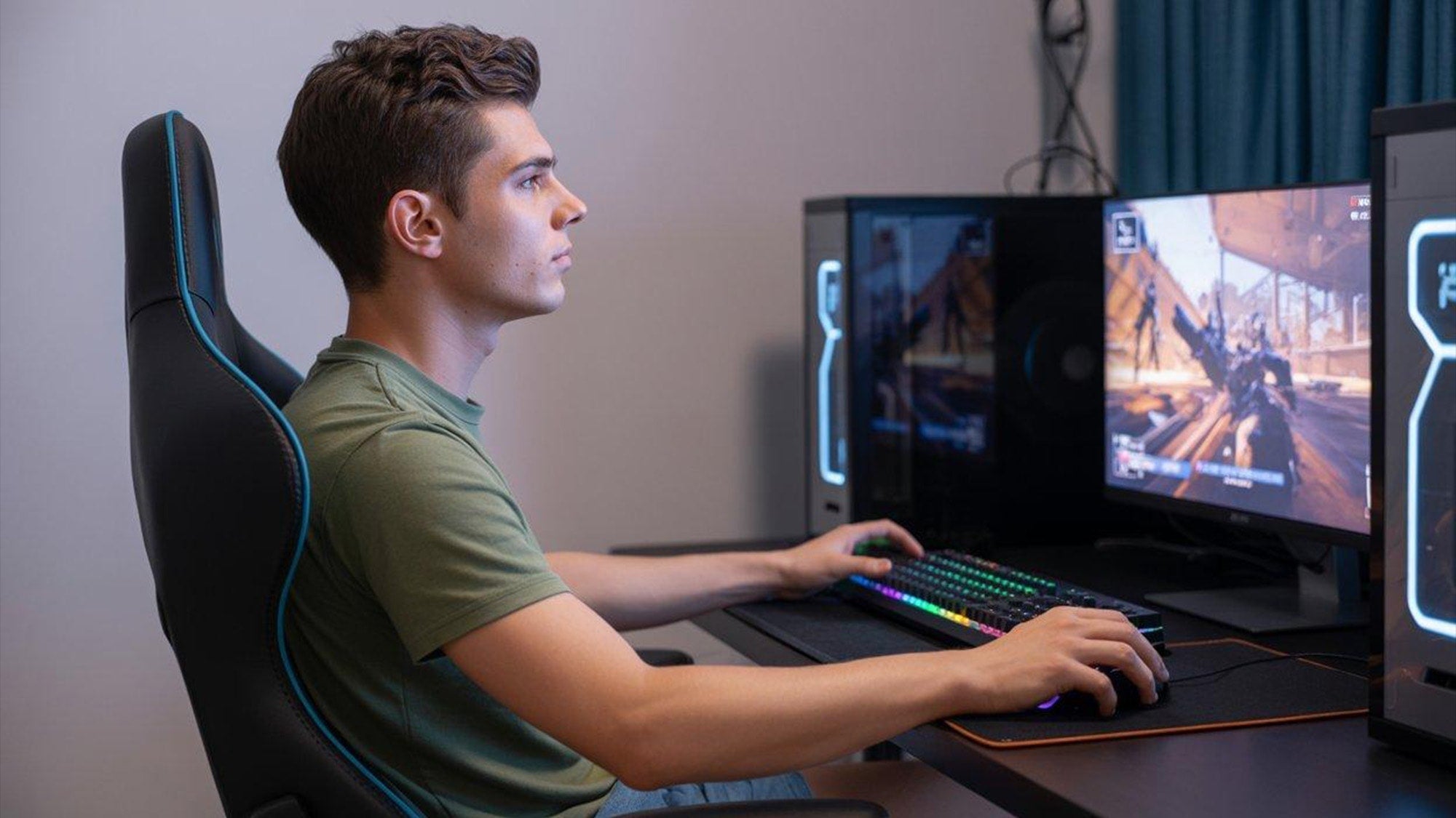 Gaming ergonomics for long sessions: a player maintaining a healthy upright sitting posture on a premium eSports chair.