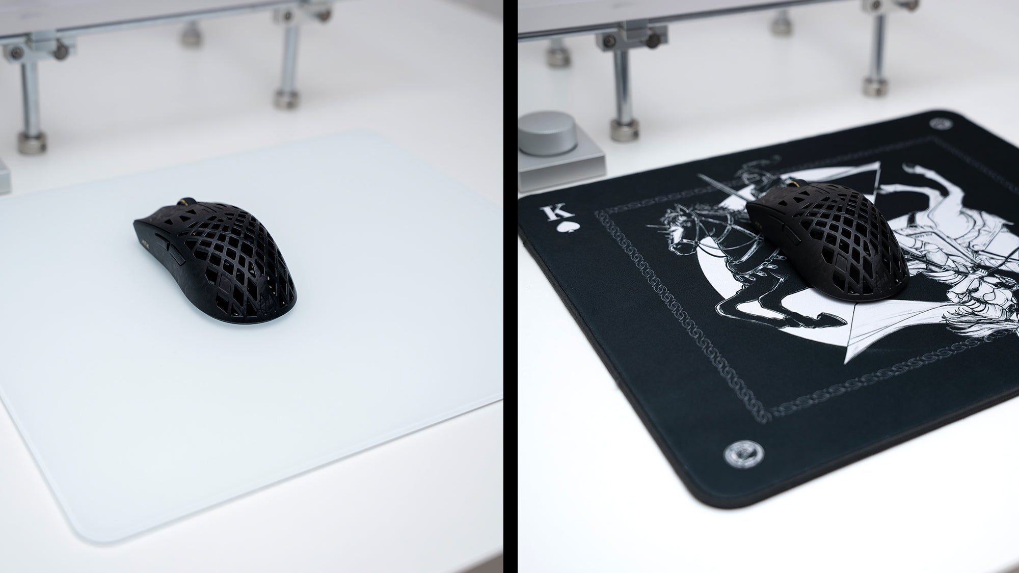 Black honeycomb gaming mouse on glass and illustrated cloth pads