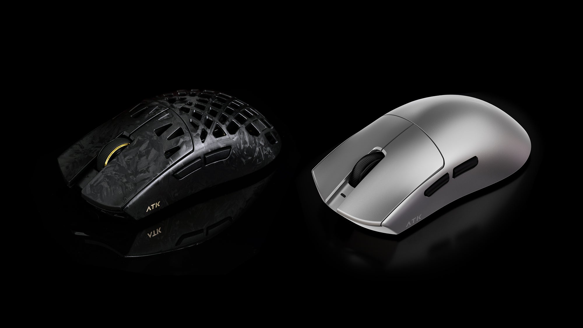 ATK honeycomb carbon fiber gaming mouse next to a silver solid shell lightweight mouse