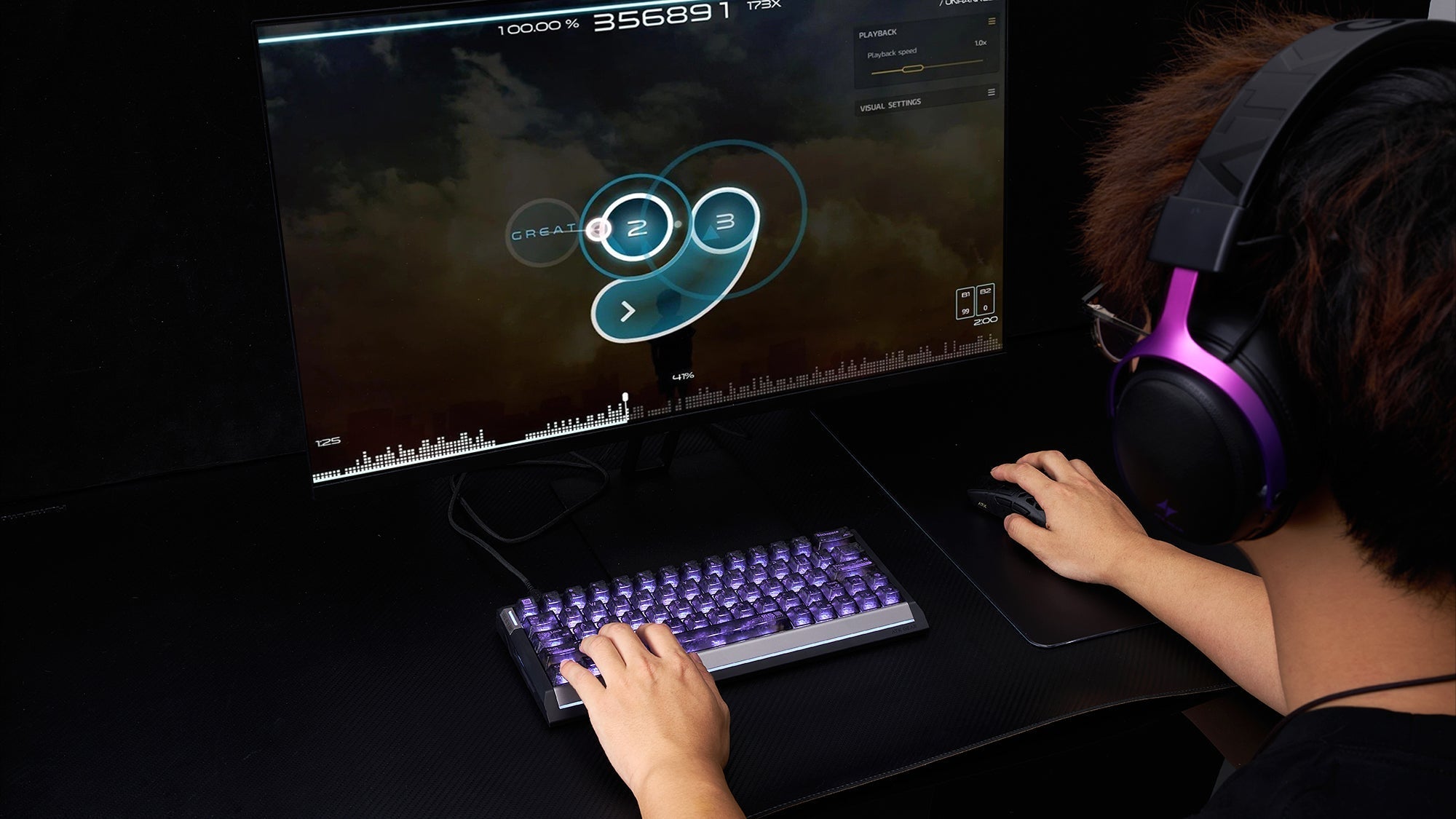 Gamer playing osu rhythm game with ATK magnetic switch mechanical keyboard and gaming headset.