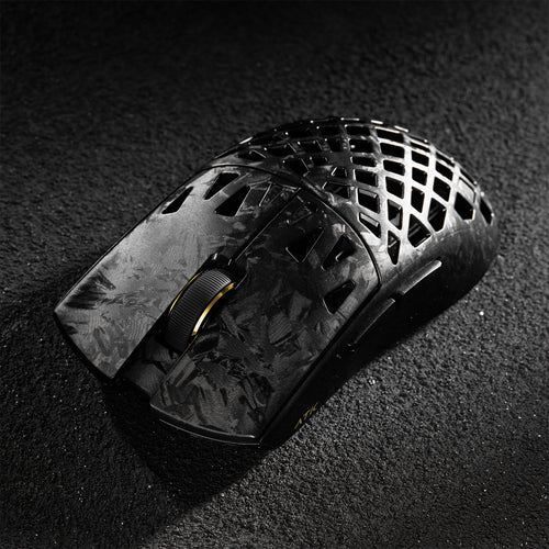 ATK Blazing Sky GHOST hollow carbon fiber wireless gaming mouse with textured grip and gold scroll wheel.