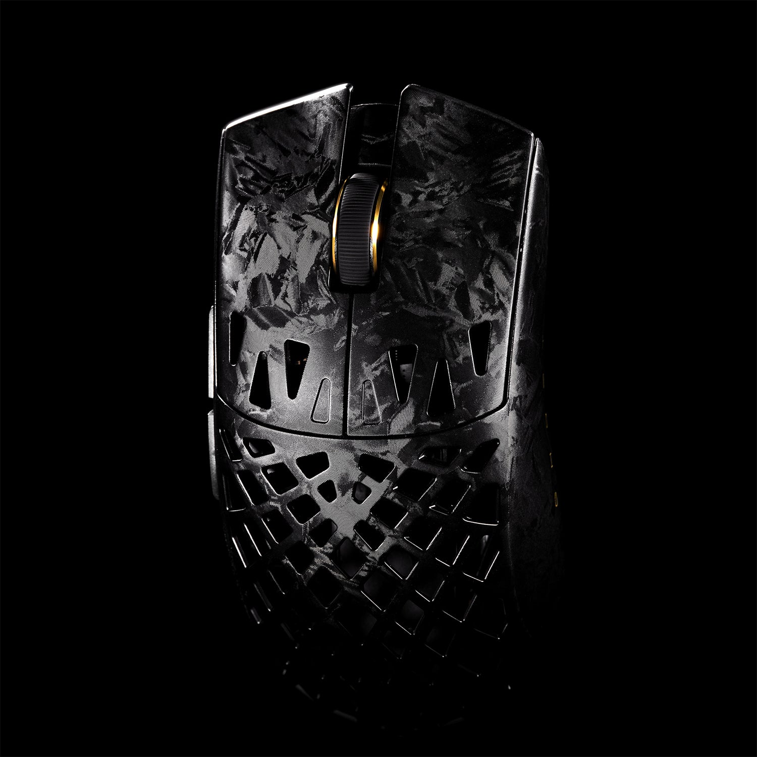 ATK Blazing Sky GHOST wireless gaming mouse with hollow carbon fiber design and gold scroll wheel.