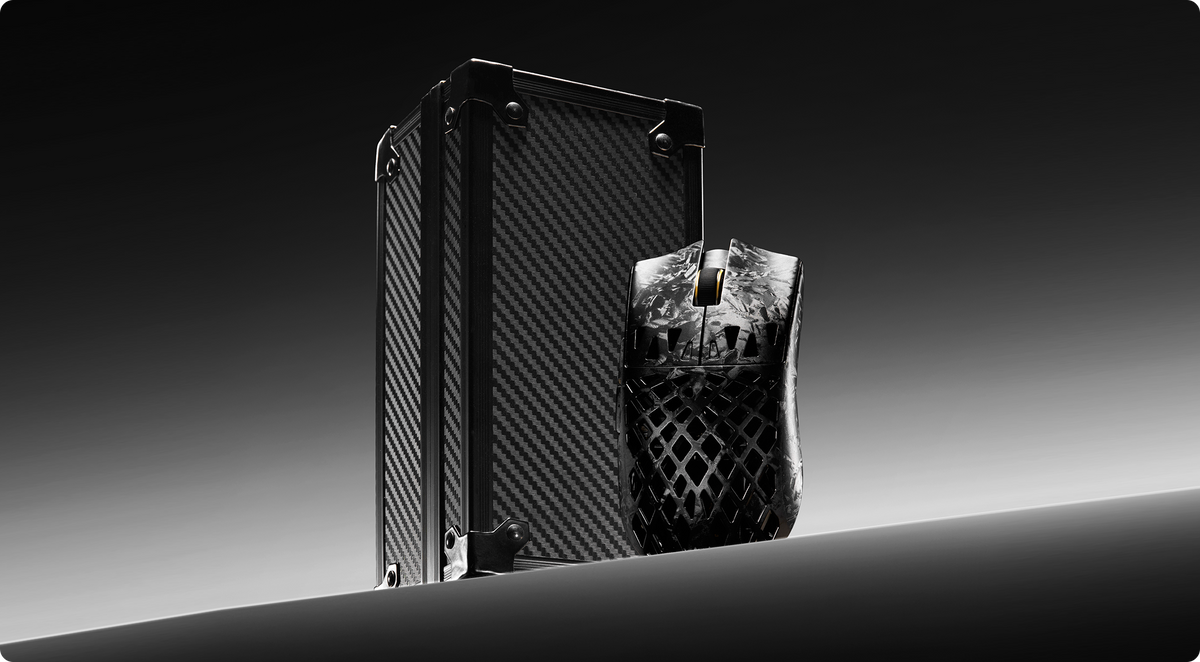 ATK GHOST mouse in the carbon fibre-textured Armory Case