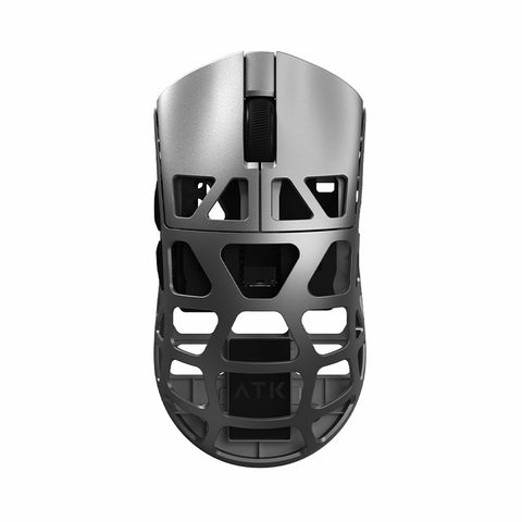 ATK FIERCE X lightweight magnesium alloy gaming mouse in silver gray with a honeycomb shell design.