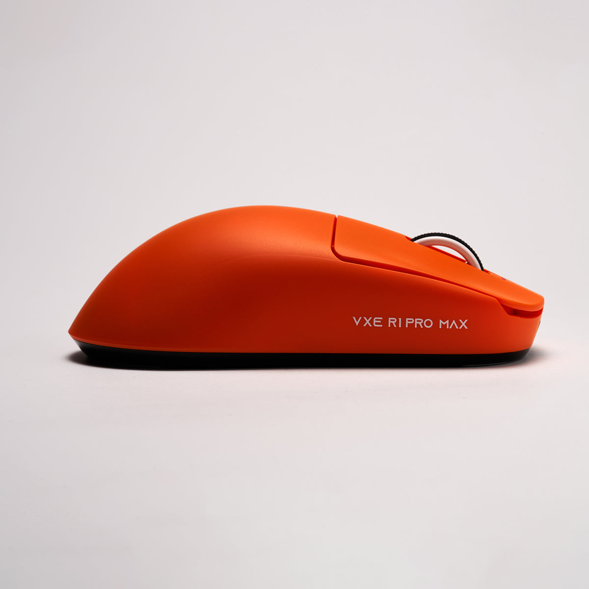 Orange VXE R1 PRO MAX wireless gaming mouse with white text logo on a white background, side view.
