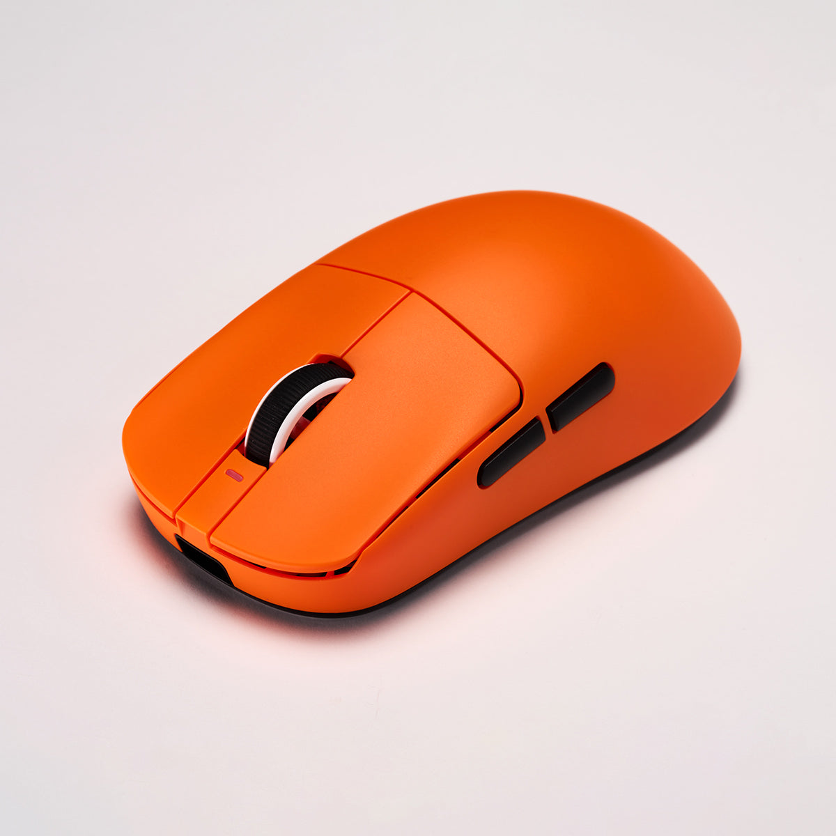 Orange VXE Dragonfly R1 Series wireless gaming mouse with black buttons and a white/black scroll wheel.