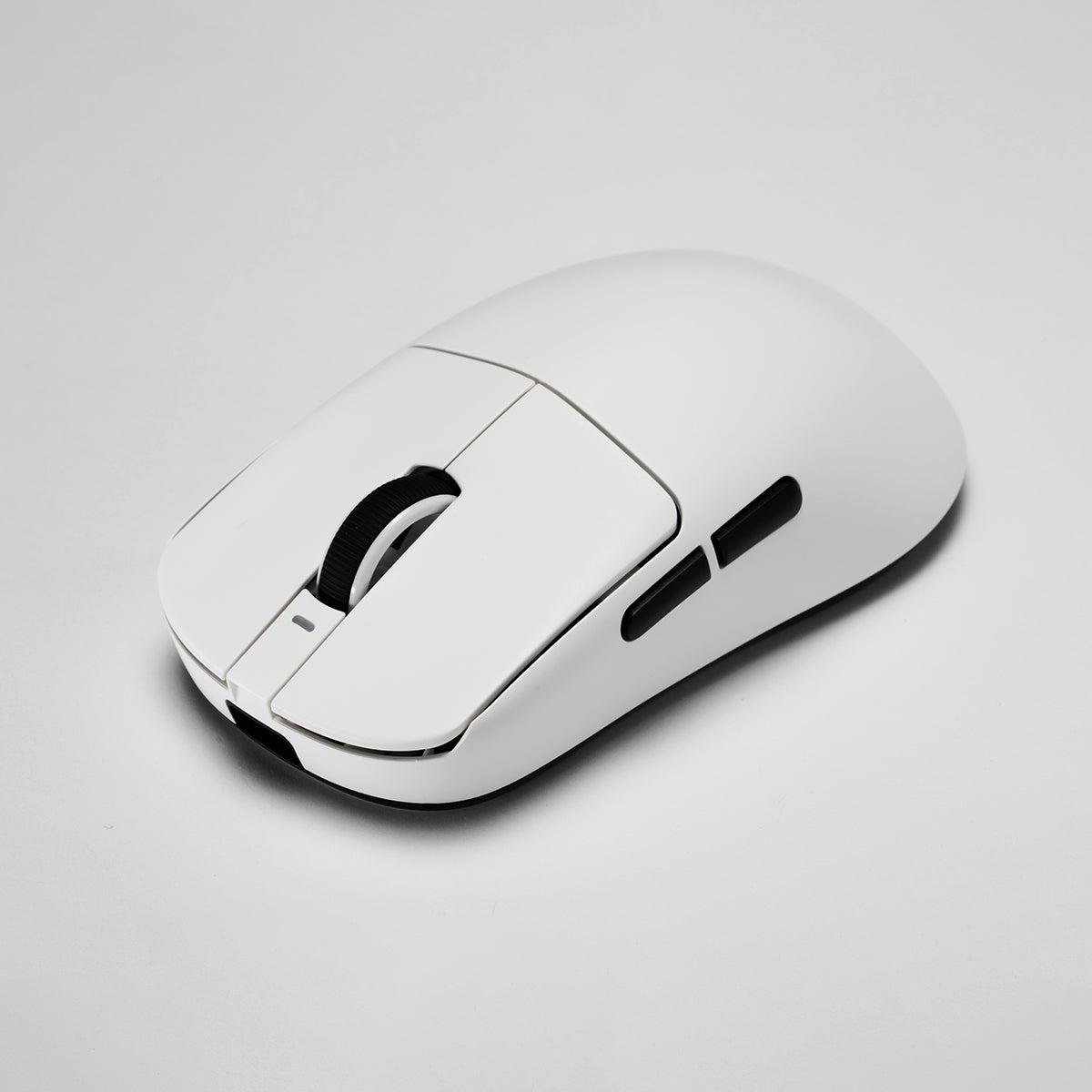 White VXE Dragonfly R1 Series wireless gaming mouse with black scroll wheel and side buttons